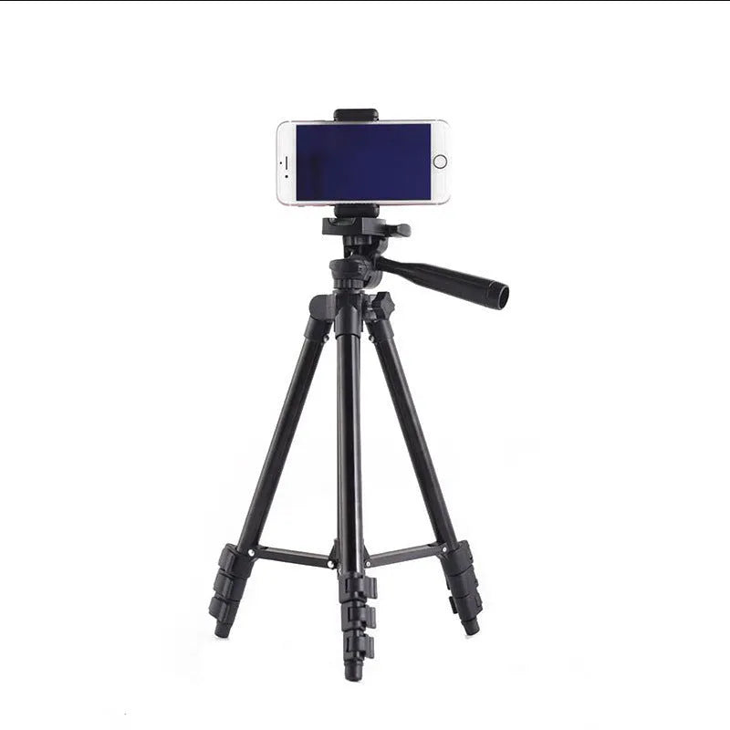 Black portable camera tripod extended to maximum height with quick-release plate