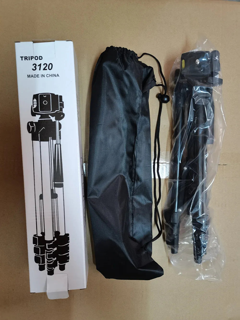 Black portable camera tripod extended to maximum height with quick-release plate