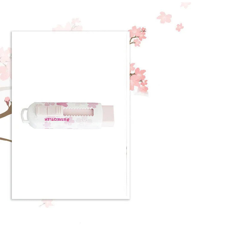 Pink student-use whiteboard cleaner with replaceable rubber core and push-pull mechanism
