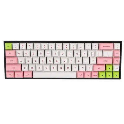 Set of 68 PBT plastic keycaps for a mechanical keyboard in assorted colours on a grey background.