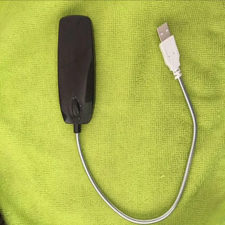 Flexible gooseneck USB LED desk lamp in black, bent to show adjustable light positioning.