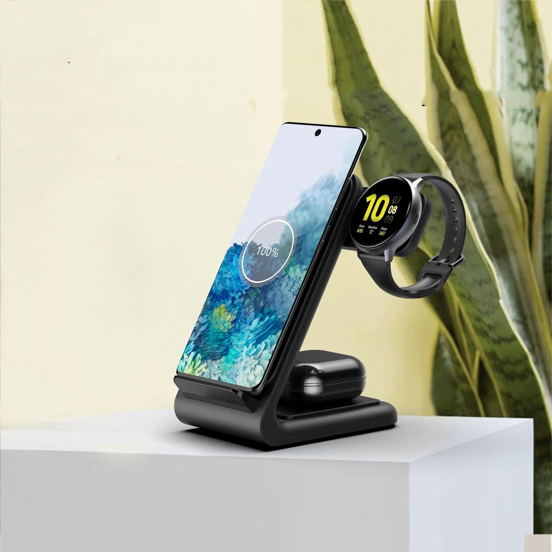 Three-in-one wireless charging bracket showing smartphone, smart watch and earbud charging slots