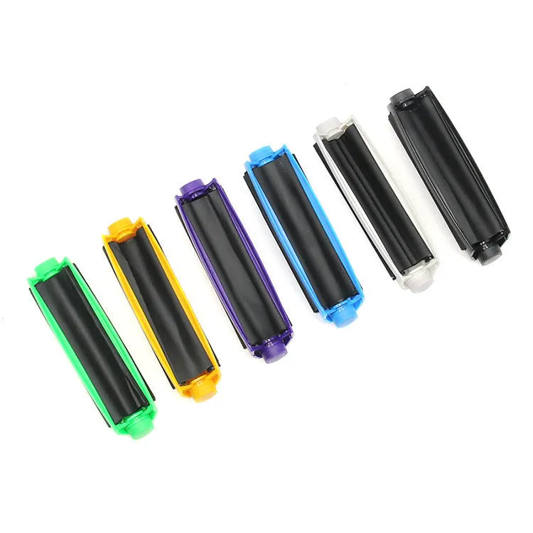 Manual plastic cigarette maker for 110mm shredded tobacco cigarettes in multiple colours.