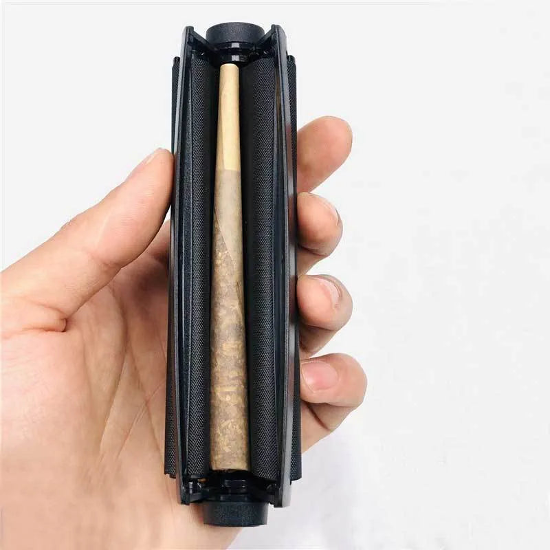 Manual plastic cigarette maker for 110mm shredded tobacco cigarettes in multiple colours.