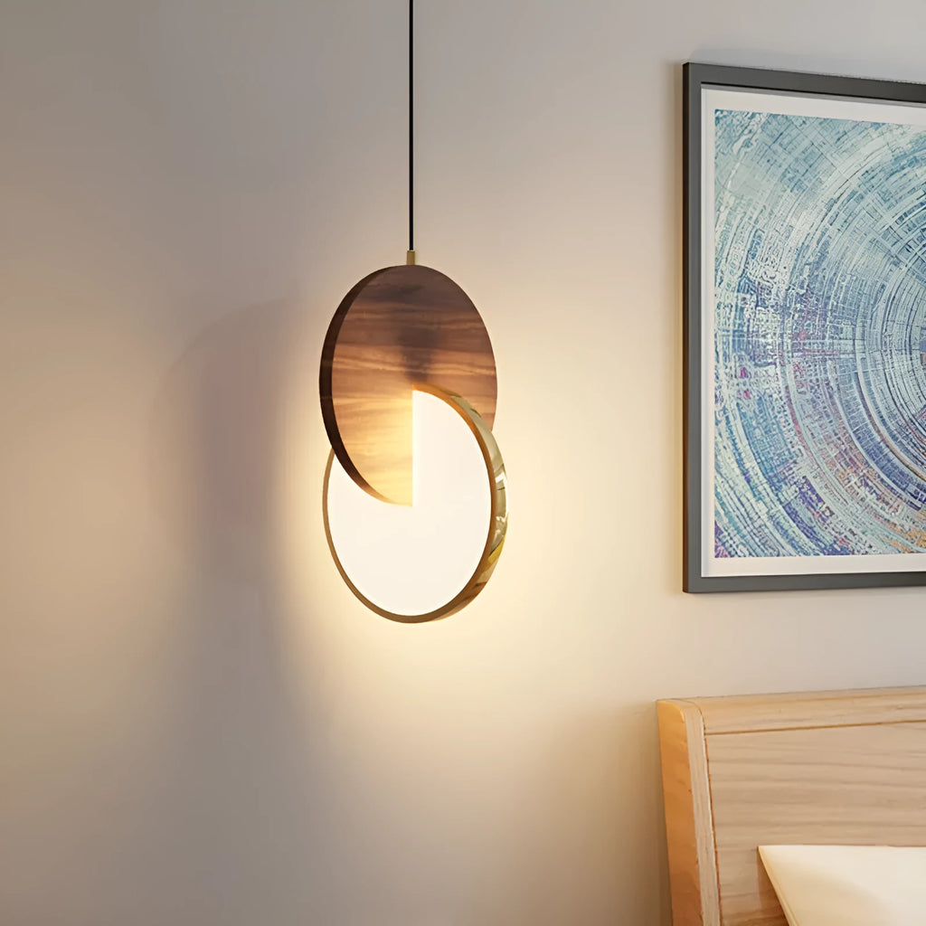 Modern long-line wooden chandelier with carved walnut body mounted on a wall