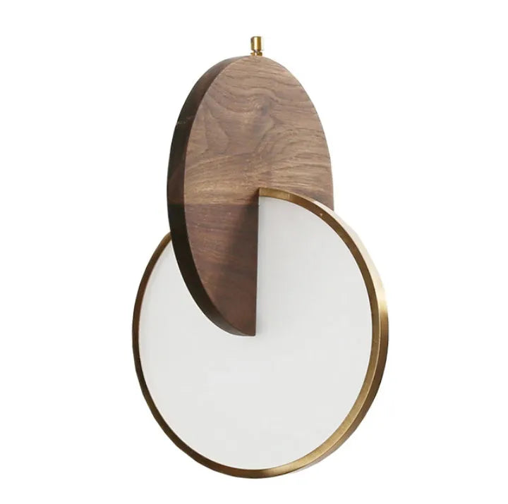 Modern long-line wooden chandelier with carved walnut body mounted on a wall