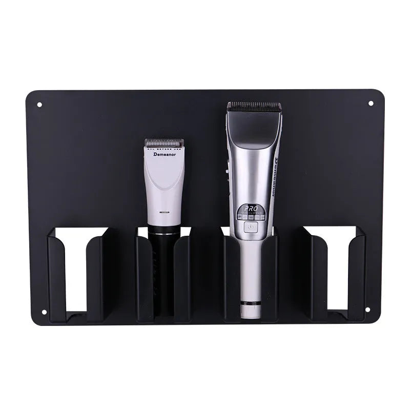 Black plastic clipper frame holding four electric hair clippers with wall-mounting screws