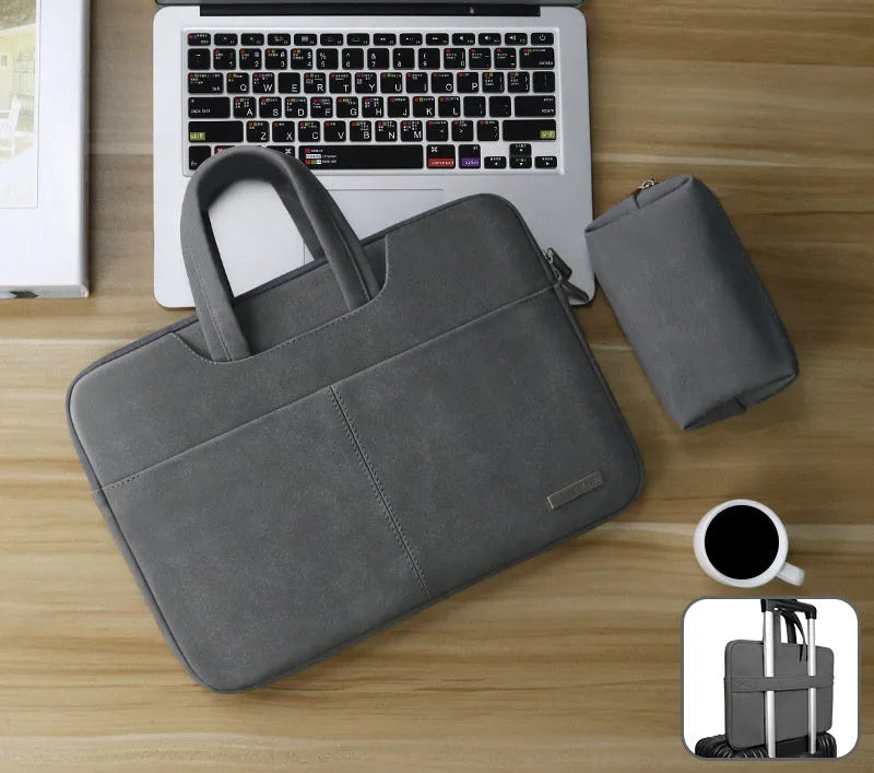 Blue PU leather laptop sleeve bag open to show internal organiser pockets for a MacBook, phone, and cards.
