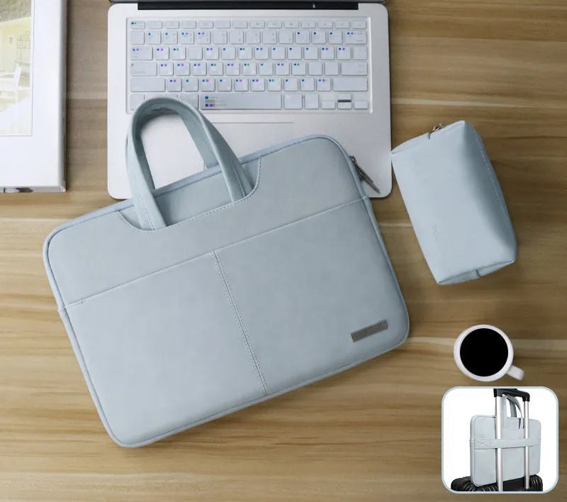 Blue PU leather laptop sleeve bag open to show internal organiser pockets for a MacBook, phone, and cards.