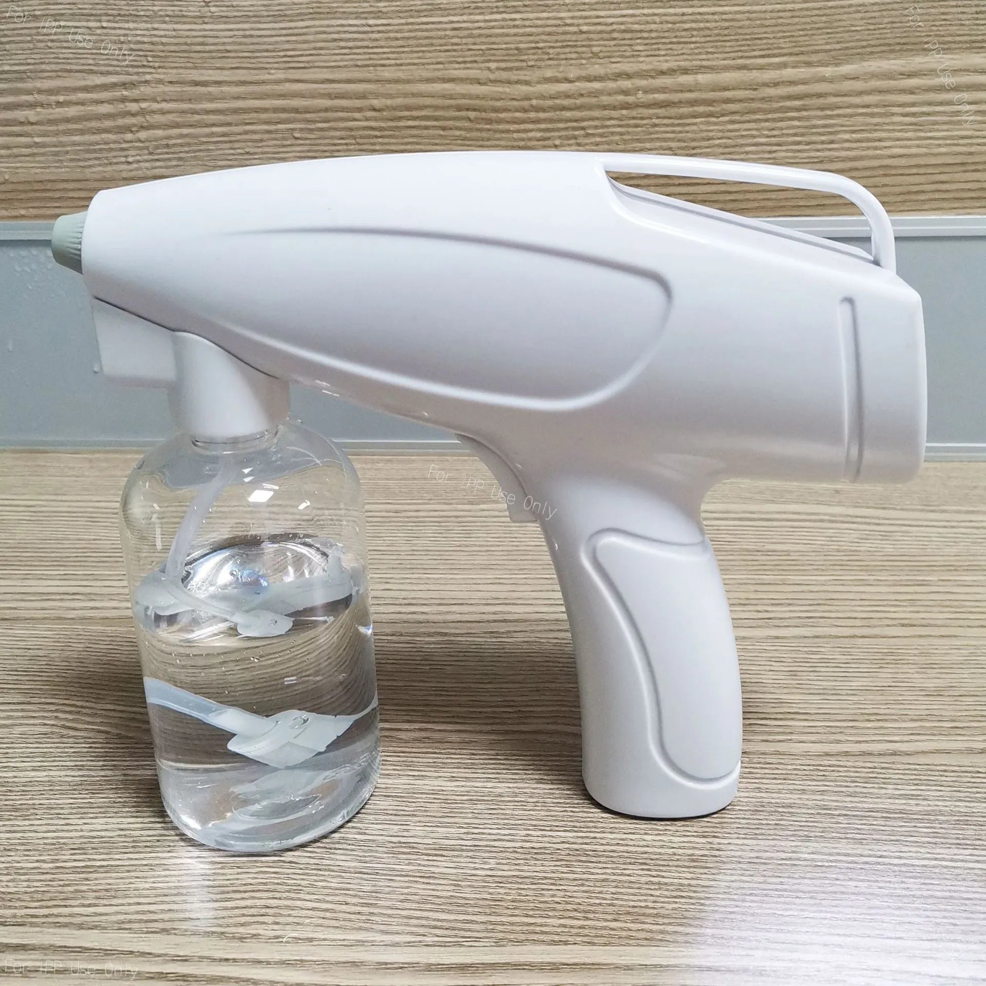 White handheld wireless electric spray disinfection gun with USB-C charging port