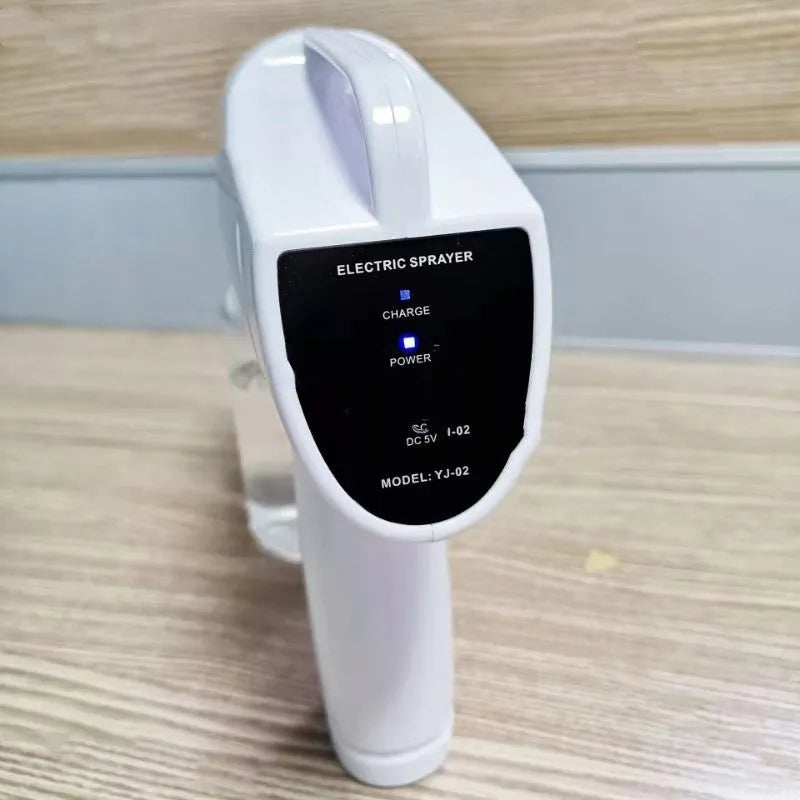 White handheld wireless electric spray disinfection gun with USB-C charging port
