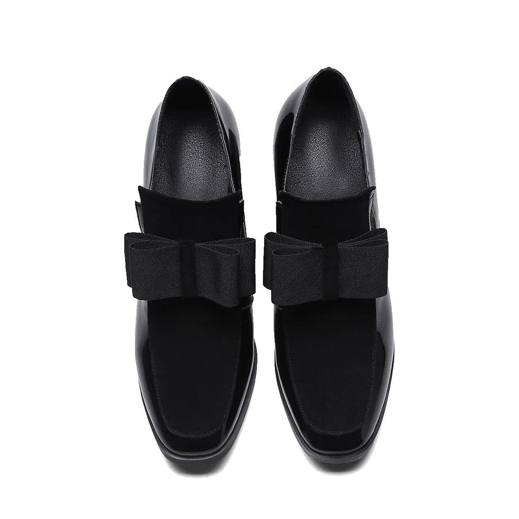 Women's black leather high heels with a thick square heel over 8cm and a square toe.