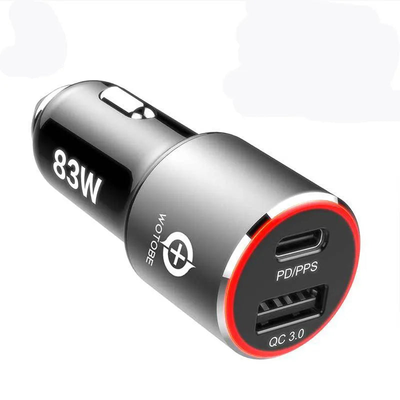83W dual port fast car charger with USB-C and QC3.0 ports for laptops and phones on a car dashboard.