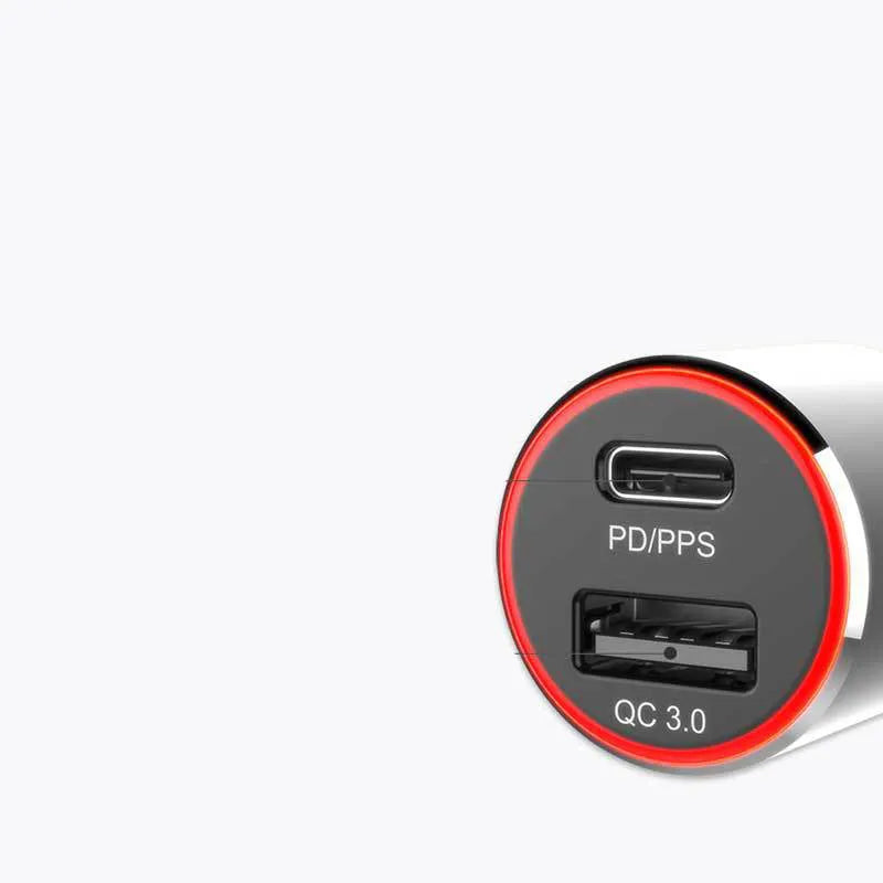 83W dual port fast car charger with USB-C and QC3.0 ports for laptops and phones on a car dashboard.