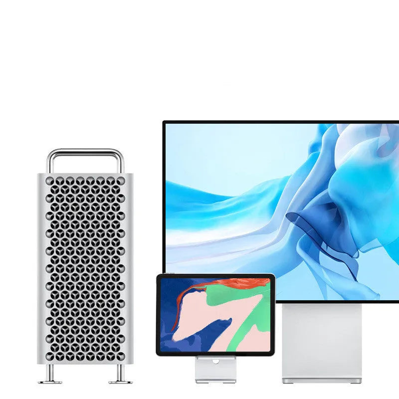 Alloy mobile phone and tablet holder stand in dark space grey and silver on a desktop.