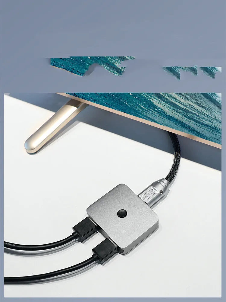 Grey Haibeisi HDMI splitter switcher device with two input and one output ports for dual-screen display