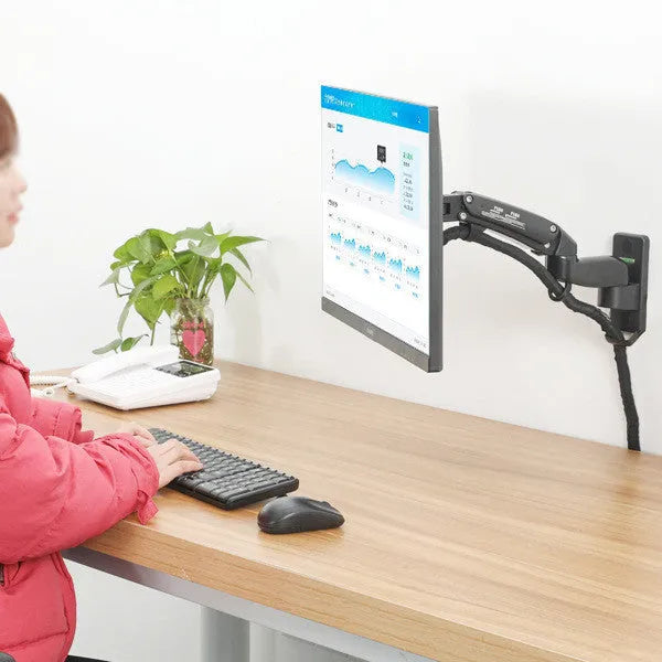 Black wall-mounted computer monitor stand with telescopic arm and rotating screen bracket.