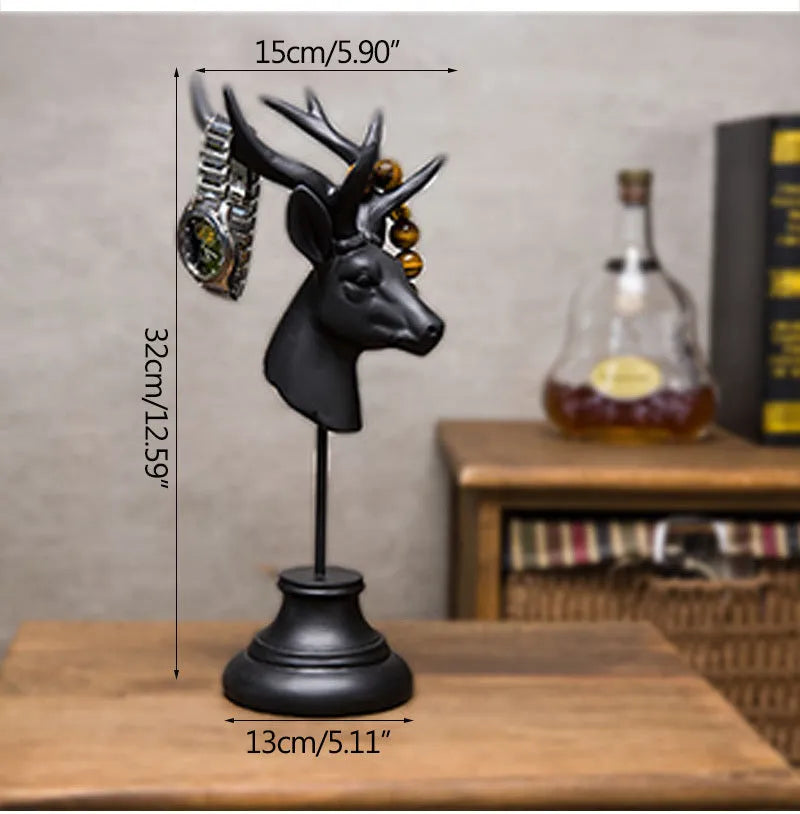 Woodland animal resin sculpture home decoration in black, white, and wood colour finishes.