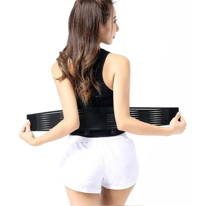 A black self-heating waist protection belt with a magnetic closure, laid flat.