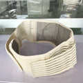 A black self-heating waist protection belt with a magnetic closure, laid flat.