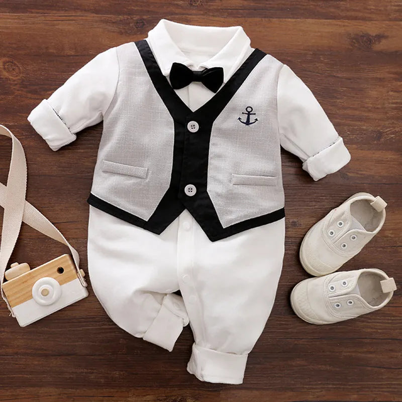 Long-sleeved cotton baby jumpsuit for boys in navy blue gentleman style, suitable for newborns and infants.