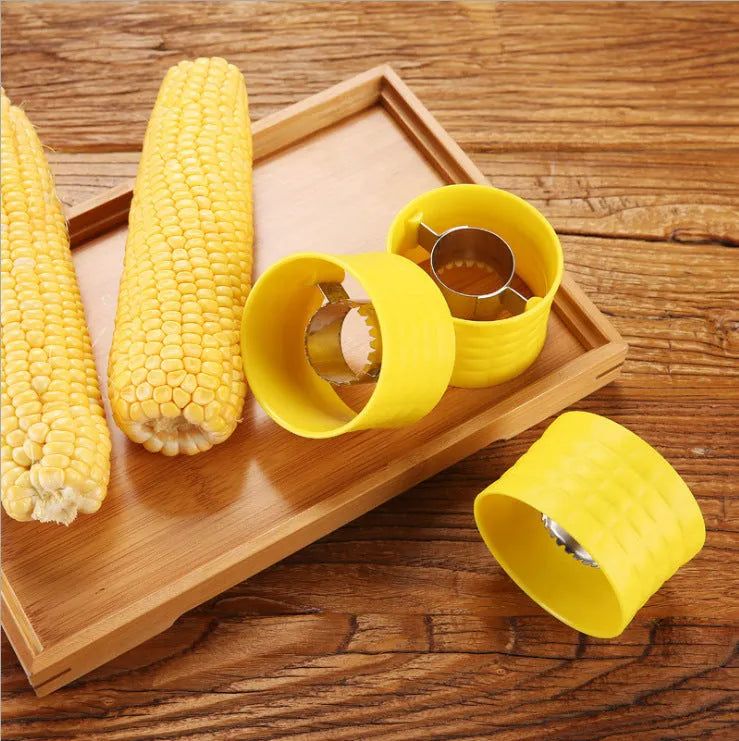 Yellow manual corn grinder thresher with corn-shaped design and stainless steel gear