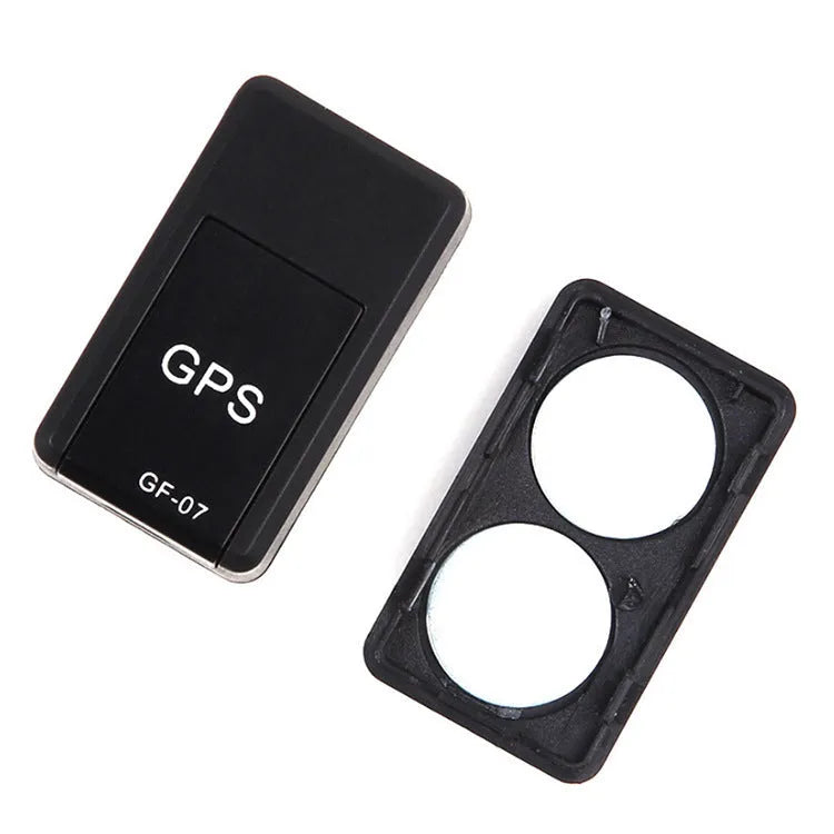 Black plastic mini magnetic GPS car tracker measuring 35×20×14mm with USB charging cable