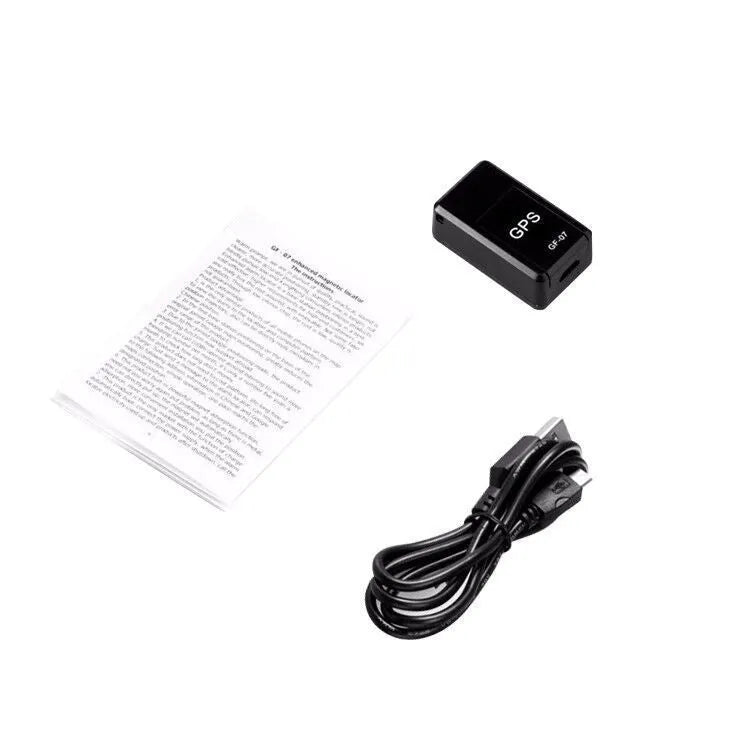 Black plastic mini magnetic GPS car tracker measuring 35×20×14mm with USB charging cable