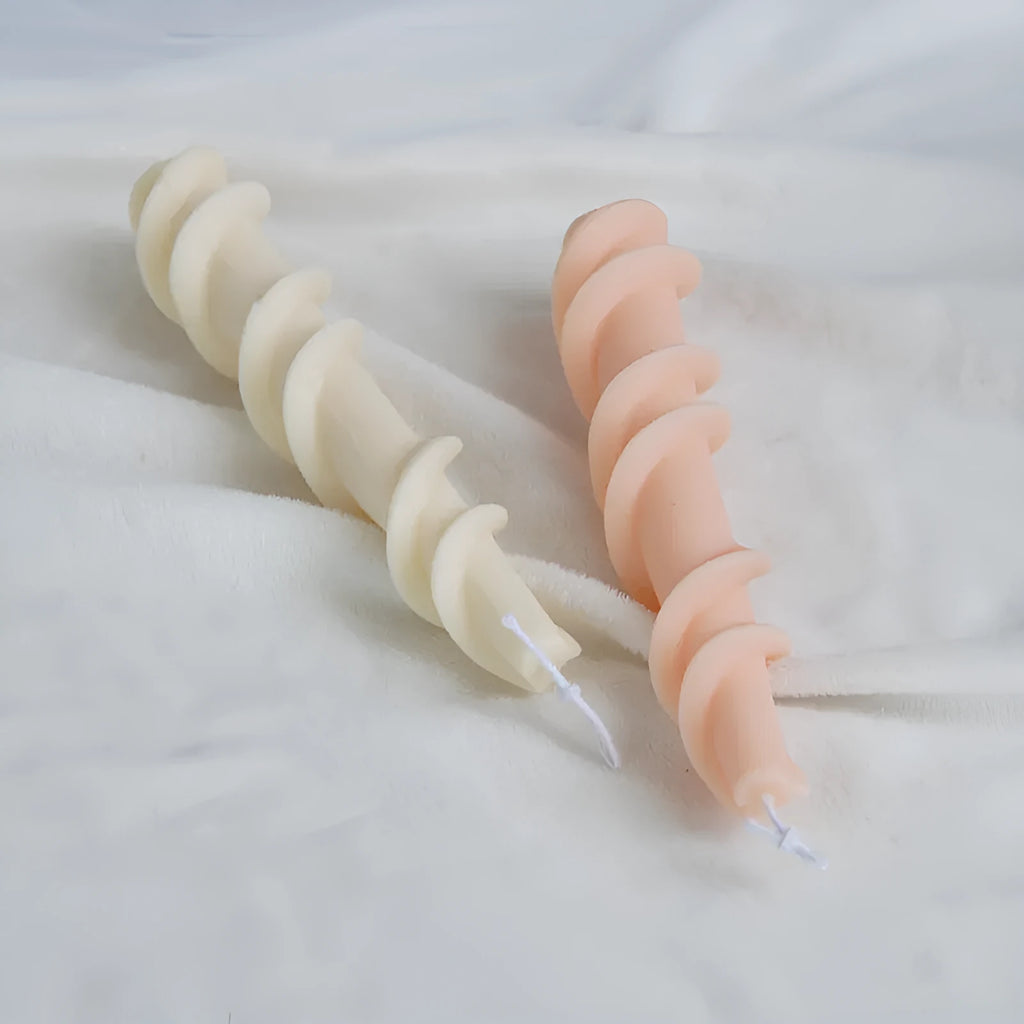 Handmade silicone screw wax mould for creating spiral lace pattern candles in assorted colours