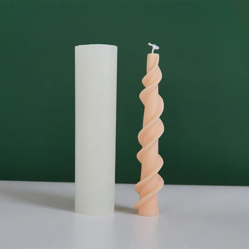 Handmade silicone screw wax mould for creating spiral lace pattern candles in assorted colours