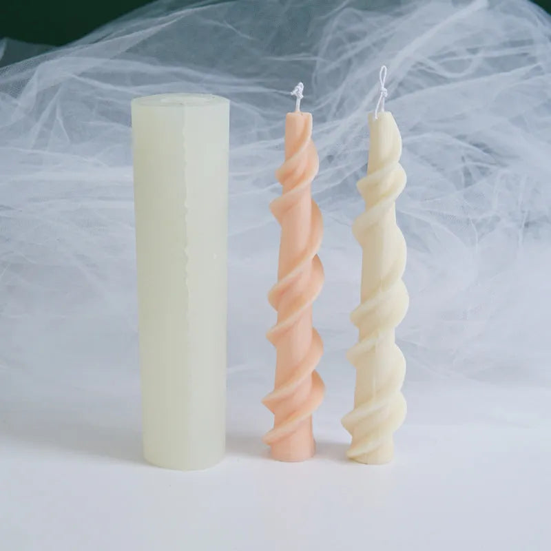 Handmade silicone screw wax mould for creating spiral lace pattern candles in assorted colours