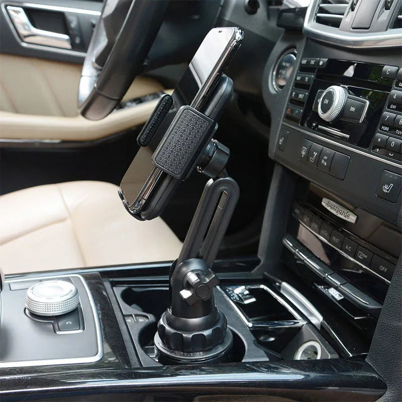 Black ABS plastic car phone holder with clip-on vent mount and 360-degree rotating head.