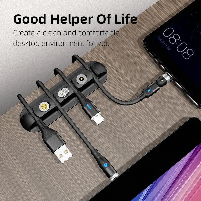 Black soft plastic desktop magnetic charging cable organiser with multiple cable slots