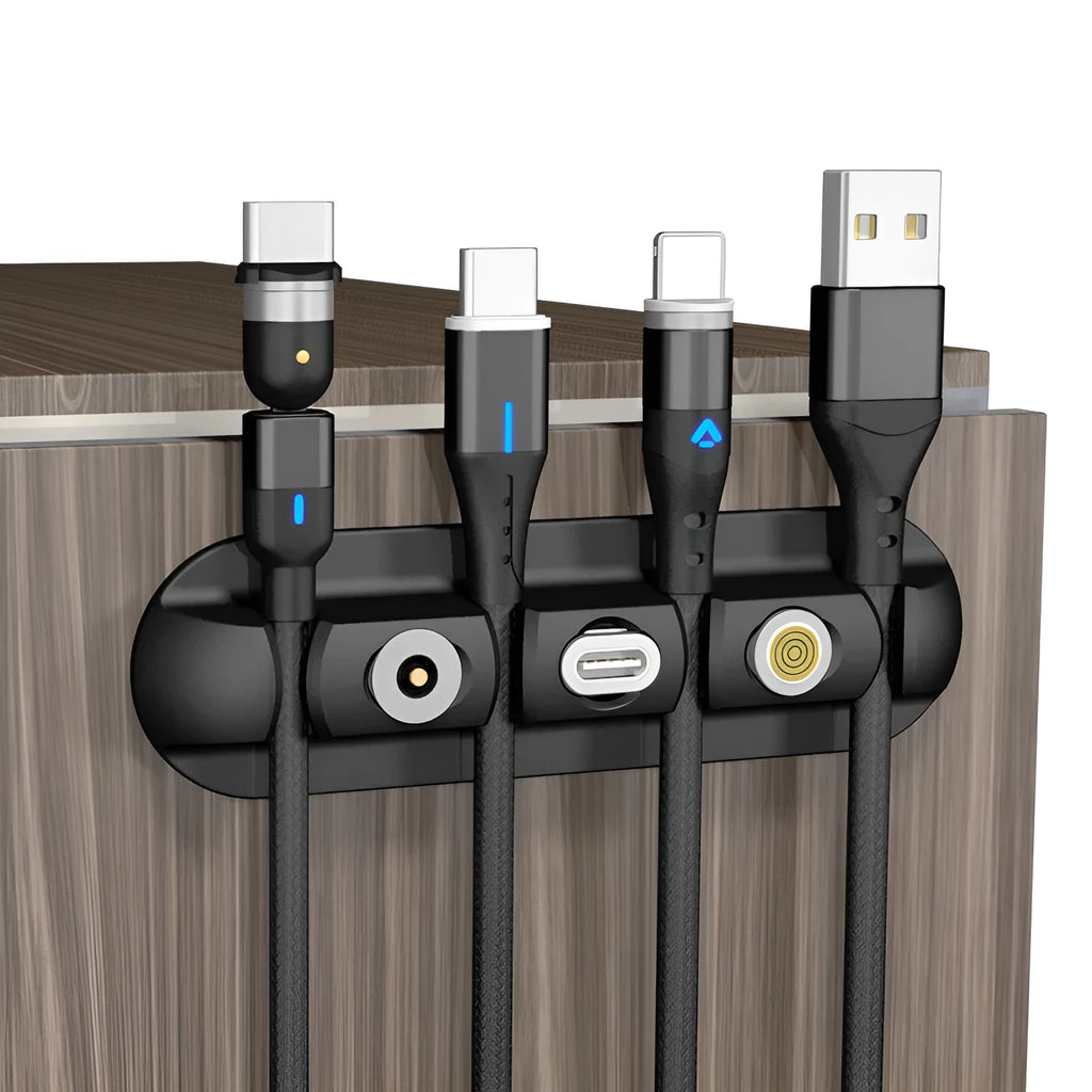 Black soft plastic desktop magnetic charging cable organiser with multiple cable slots