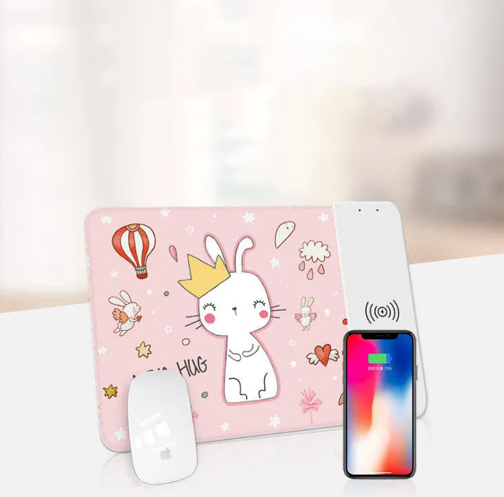 Wireless charging mouse pad with RGB lighting and cartoon design on black desk