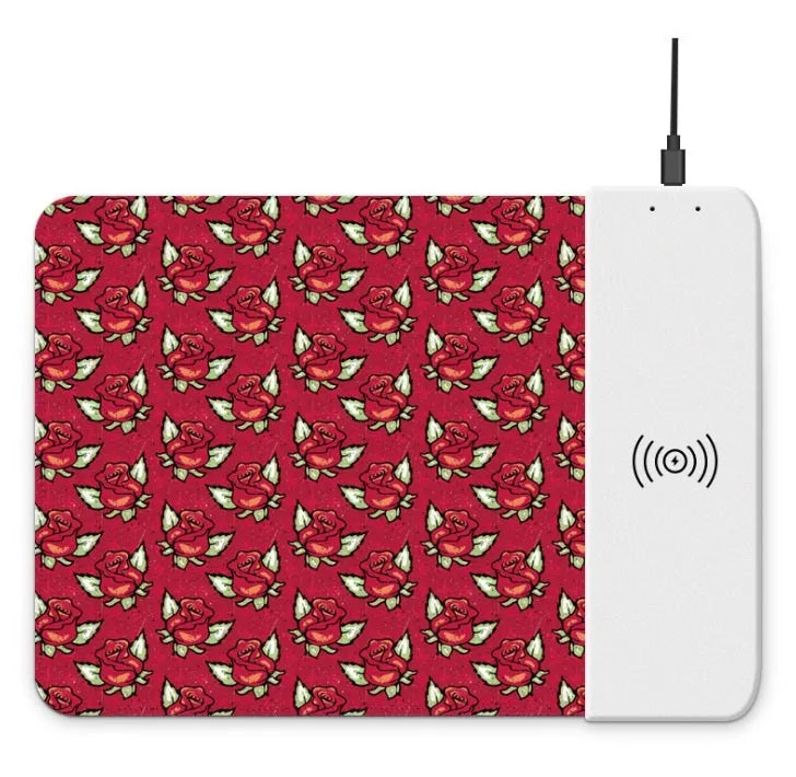 Wireless charging mouse pad with RGB lighting and cartoon design on black desk