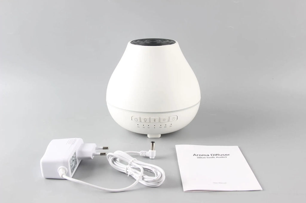 White round Bluetooth humidifier aroma diffuser with essential oil function and music playback capability