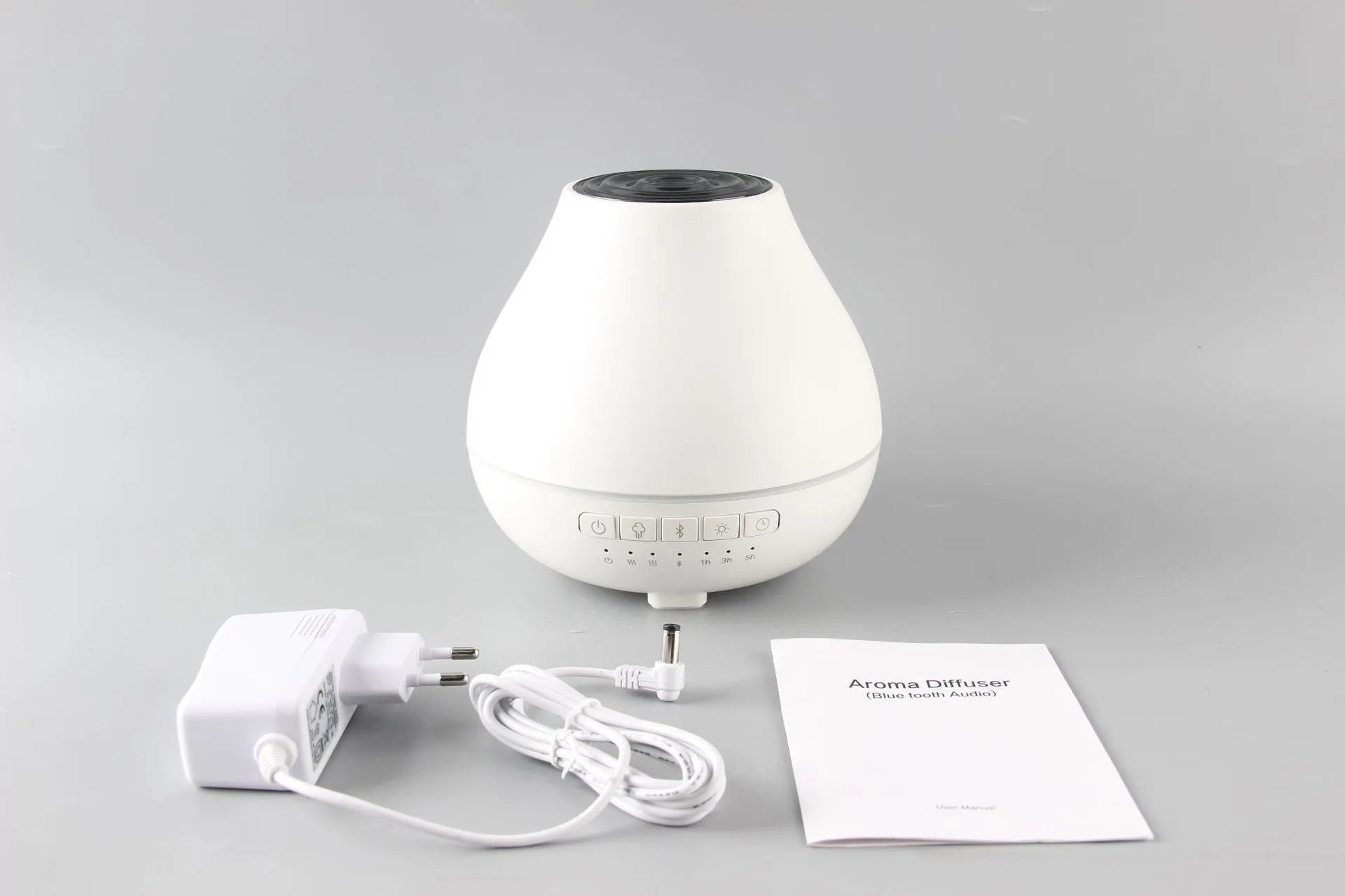 White round Bluetooth humidifier aroma diffuser with essential oil function and music playback capability