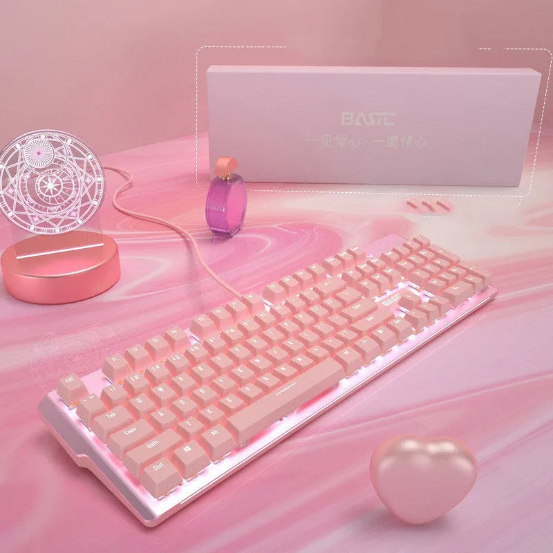 Pink mechanical keyboard and matching wired gaming mouse set on desktop