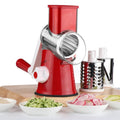 Multi-function blue vegetable chopper with suction cup base on a kitchen counter