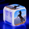 Square cartoon alarm clock with LED display showing time and temperature