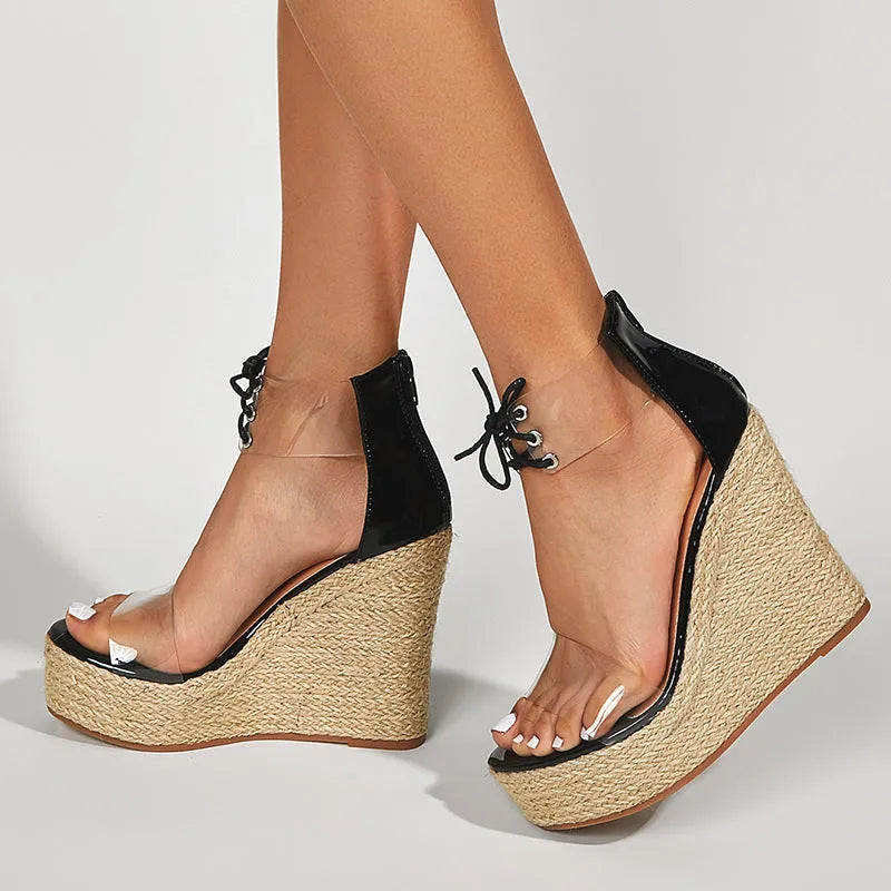 Black women's wedge sandals with hemp rope texture on 8cm heel and front tie closure.