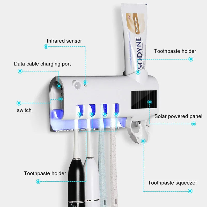 Black and white intelligent UV toothbrush steriliser with automatic toothpaste squeezer mounted on a bathroom wall.
