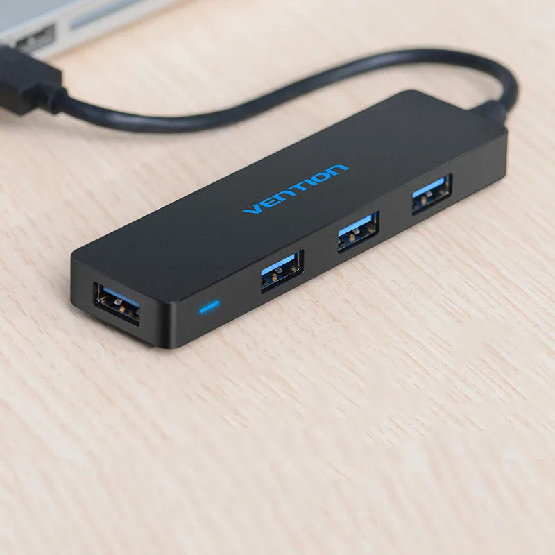 Black USB 3.0 four-port hub with 0.15m cable and nickel-plated connectors