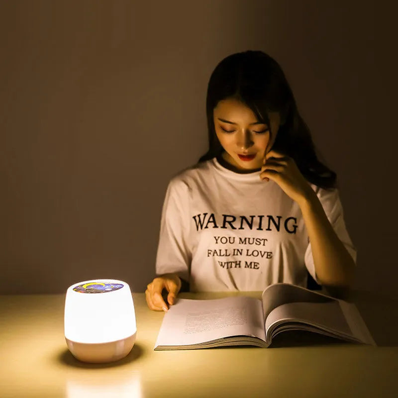 Pruixin rotating LED projector night light showing star patterns on a bedroom wall
