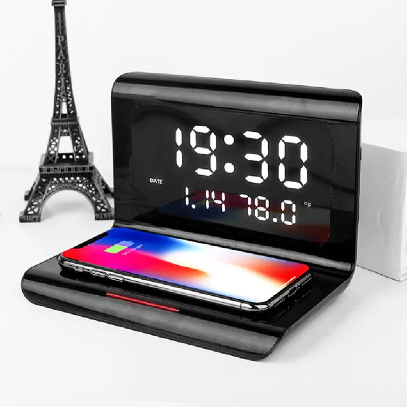 White wireless charger alarm clock displaying time, calendar, temperature and humidity readings