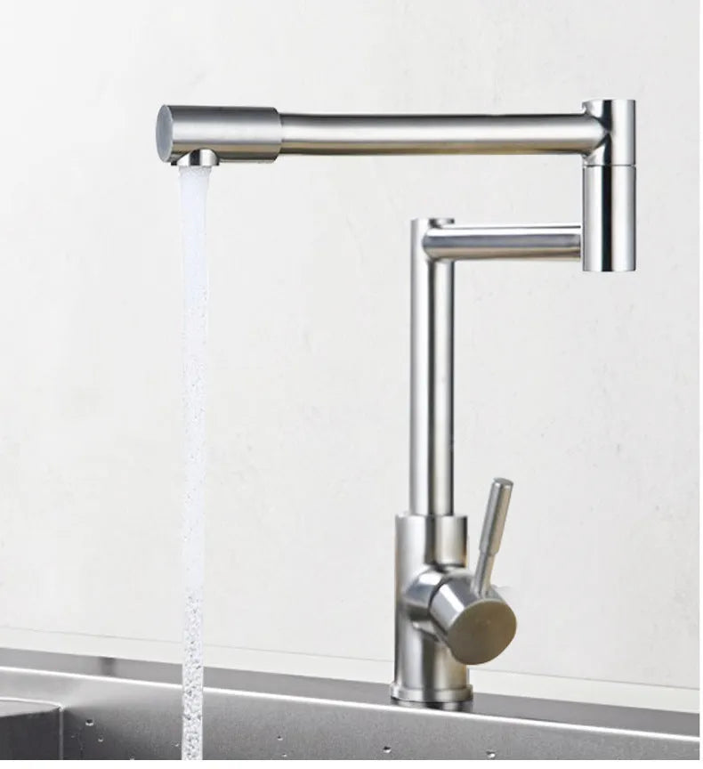 Silver stainless steel kitchen mixer tap with dual lift-up controls and rotating spout