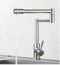 Silver stainless steel kitchen mixer tap with dual lift-up controls and rotating spout