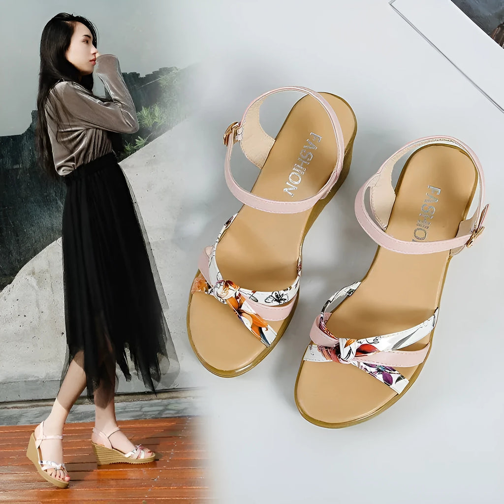 Women's pink wedge sandals with a thick heel, one-strap buckle, and a non-slip sole.