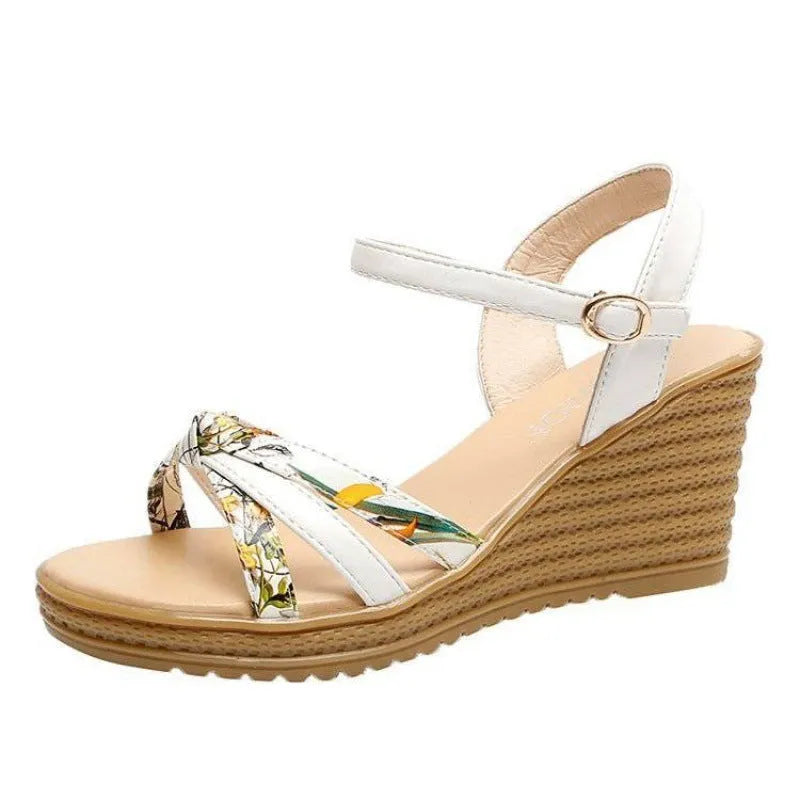 Women's pink wedge sandals with a thick heel, one-strap buckle, and a non-slip sole.